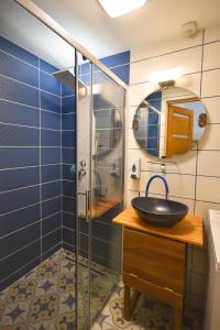 a bathroom with a sink and a shower at Comfortable Apartament on the Boulevard for 4 people in Budapest