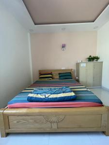 Postel nebo postele na pokoji v ubytování Ánh Dương