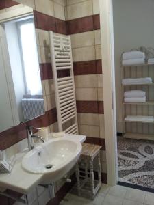 a bathroom with a sink and a mirror at La Casa al Mare in Lerici