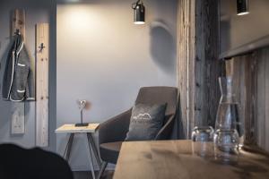 Posezení v ubytování Hotel Dosses