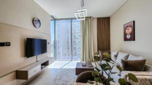 A seating area at STAY BY LATINEM Luxury 1BR Holiday Home CVR A2803 near Burj Khalifa