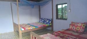 Srey Leap Homestay客房内的一张或多张床位