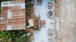 an overhead view of a yard with wooden fence and benches at สวนภูซีเขาค้อ in Ban Pa Daeng