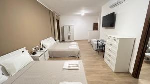 Cala Portavecchia客房内的一张或多张床位
