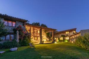 a house with a lawn in the yard at Casa rural calRei in Lles