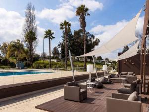 Бассейн в Novotel Setubal или поблизости