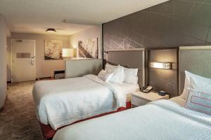 Postel nebo postele na pokoji v ubytování SpringHill Suites Anchorage Midtown + 22 fotografií