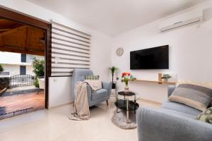 TV a/nebo společenská místnost v ubytování Apartman "ELA"