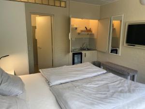 Una cama o camas en una habitación de Motel Rovli