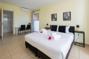 Ένα ή περισσότερα κρεβάτια σε δωμάτιο στο Het paradijs in Jan Thiel!