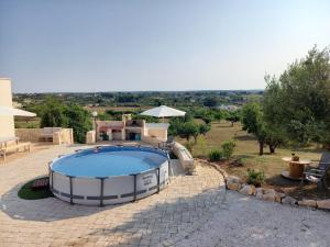 Bazén v ubytovaní il borghetto in valle d'itria alebo v jeho blízkosti