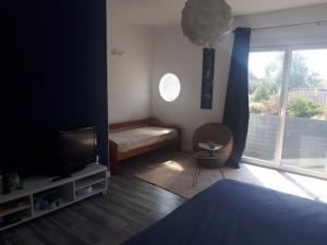 Postel nebo postele na pokoji v ubytování L'Opaline