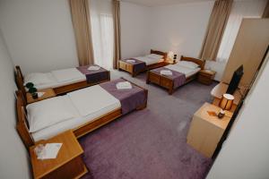 Postel nebo postele na pokoji v ubytování Motel Vila Bijela