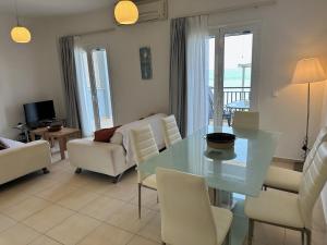 A seating area at Amaltheia Beachfront Villas