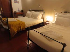 Cette chambre comprend 2 lits. dans l'établissement Monte Além Tejo, à Arraiolos