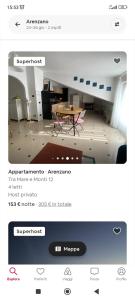 página de una habitación con mesa y mesa en Tra Mare e Monti 12, en Cogoleto