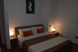 Postel nebo postele na pokoji v ubytování B&B Garden Grazia