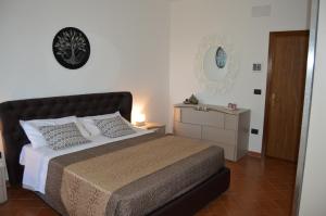 Postel nebo postele na pokoji v ubytování B&B Garden Grazia