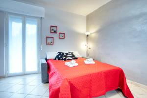 Postel nebo postele na pokoji v ubytování CaseOspitali - Casa Valza, bilocale in contesto di corte per 4