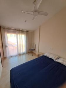 Voodi või voodid majutusasutuse Lo Faro toas