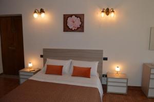 Postel nebo postele na pokoji v ubytování B&B Garden Grazia