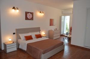 Postel nebo postele na pokoji v ubytování B&B Garden Grazia