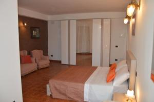 Postel nebo postele na pokoji v ubytování B&B Garden Grazia
