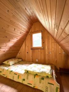 Postel nebo postele na pokoji v ubytování Apartman Kurjak