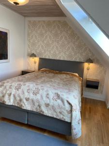 Krevet ili kreveti u jedinici u okviru objekta Hotel Højslev Kro