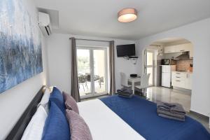 Postel nebo postele na pokoji v ubytování Apartments Zorica