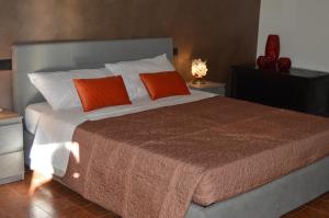 Postel nebo postele na pokoji v ubytování B&B Garden Grazia