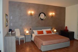 Postel nebo postele na pokoji v ubytování B&B Garden Grazia