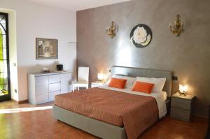 Postel nebo postele na pokoji v ubytování B&B Garden Grazia