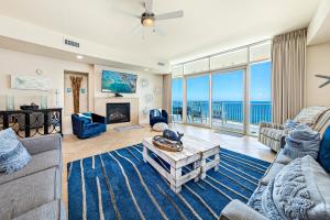 a living room with a view of the ocean at Turquoise 1908 C Turquoise Place in Orange Beach