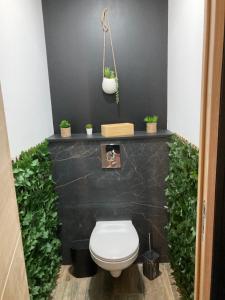 Koupelna v ubytování Lov’&Spa
