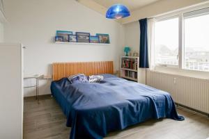Postel nebo postele na pokoji v ubytování Beach Appartement 19 - Callantsoog