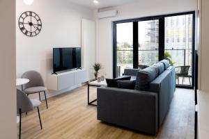 Telewizja i/lub zestaw kina domowego w obiekcie Downtown Apartments ,next to Spodek-free parking