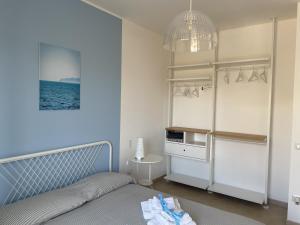 A bed or beds in a room at Aquilone Garden