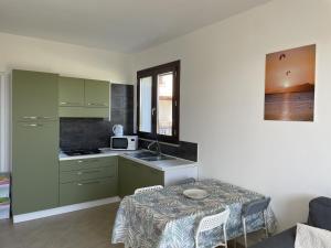 A kitchen or kitchenette at Aquilone Garden