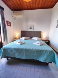 Posteľ alebo postele v izbe v ubytovaní Hotel Vrionis