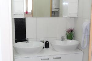 Kúpeľňa v ubytovaní Emerald Luxury Apartments
