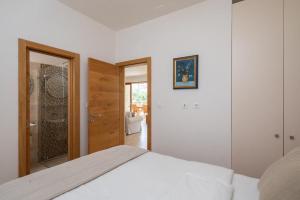 Säng eller sängar i ett rum på Villa Fora Hvar