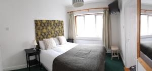 Letto o letti in una camera di The Olde Forge B & B