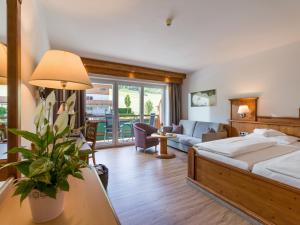 Łóżko lub łóżka w pokoju w obiekcie Hotel & Alpin Lodge Der Wastlhof