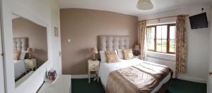Letto o letti in una camera di The Olde Forge B & B