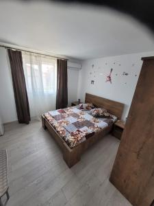 Postel nebo postele na pokoji v ubytování Vila Sofia