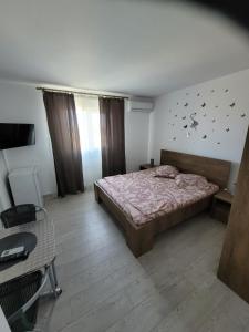 Postel nebo postele na pokoji v ubytování Vila Sofia