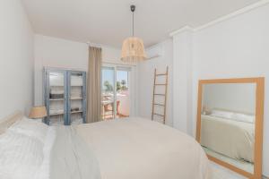 Posteľ alebo postele v izbe v ubytovaní Penthouse with amazing sea view