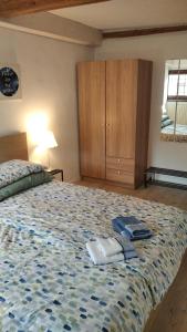 Cama ou camas em um quarto em Amnis