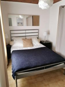 Posteľ alebo postele v izbe v ubytovaní Bel appartement dans le Centre Historique de Montpellier